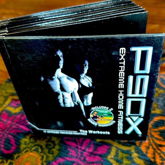 P90X Extreme Training 12 DVD set, most still in plastic wrapping - Picture 1 of 4